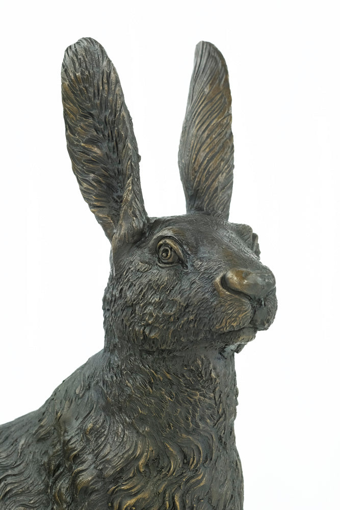 Bronze sculpture of a sitting hare with pricked ears