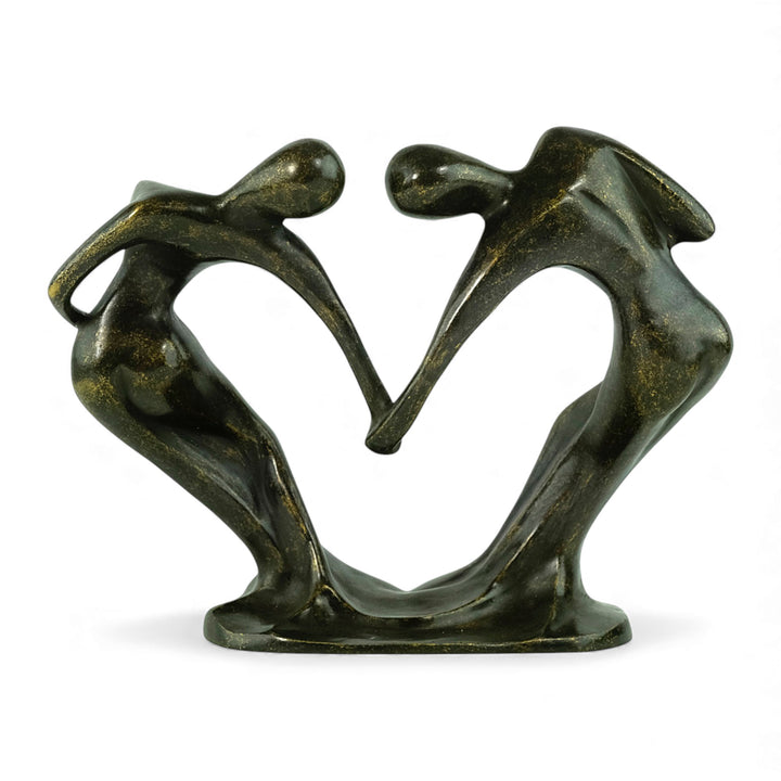 Moderne bronzen beeld van een dansend paar dat een hart vormt