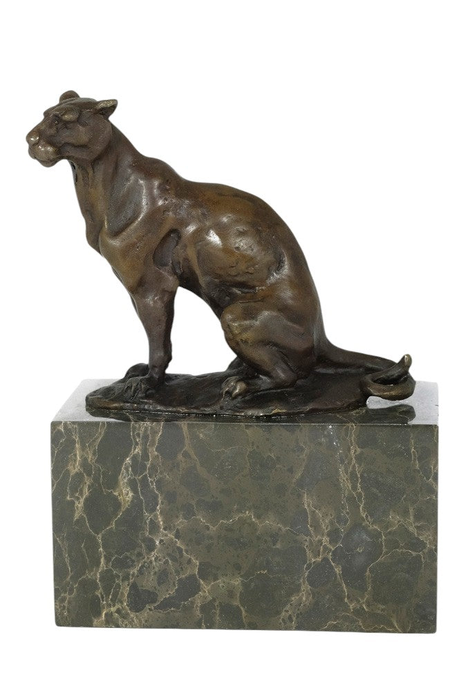 Bronze sculpture of a sitting panther