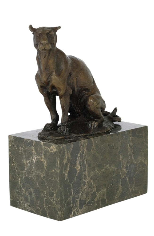Bronze sculpture of a sitting panther