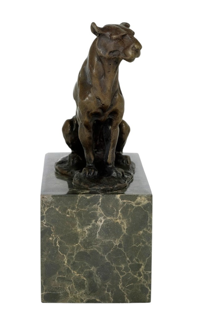 Bronze sculpture of a sitting panther