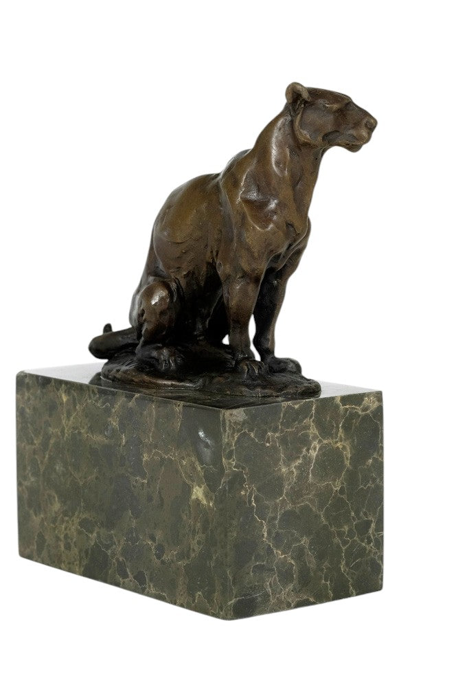 Bronze sculpture of a sitting panther