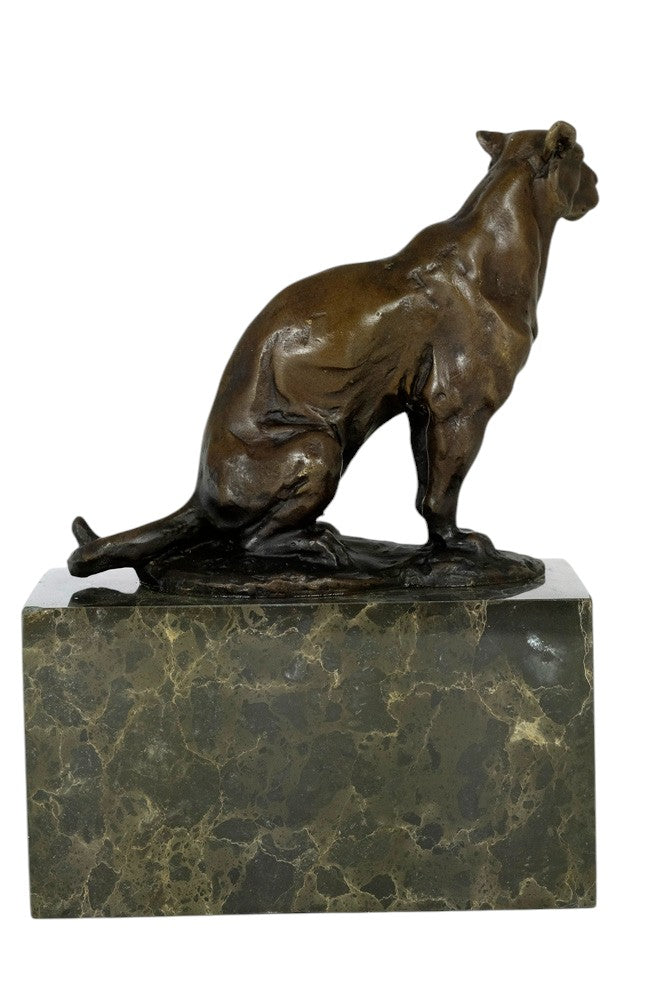 Bronze sculpture of a sitting panther