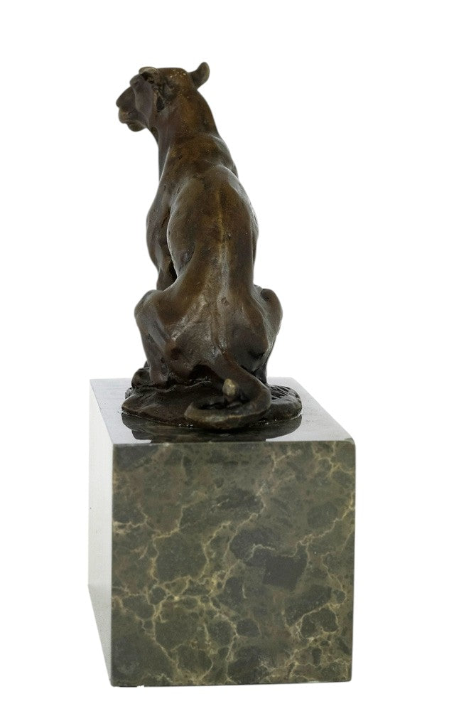 Bronze sculpture of a sitting panther