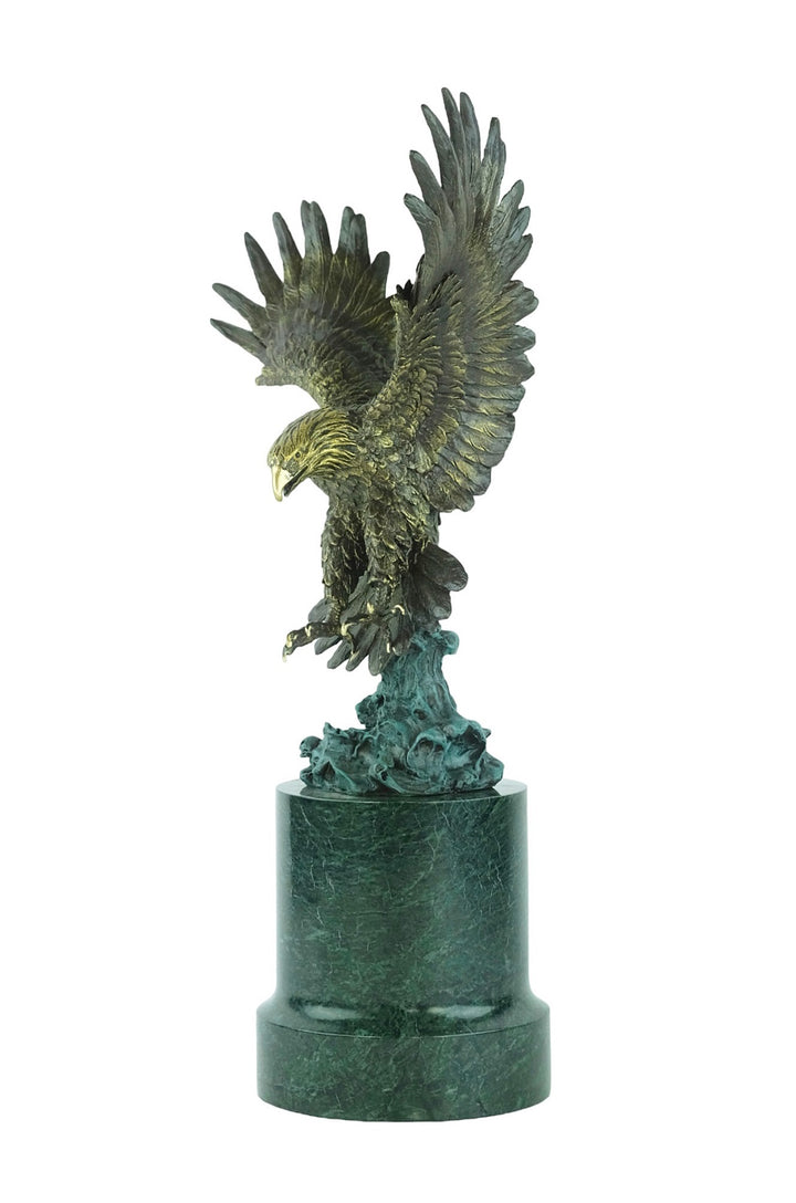 Large bronze sculpture of a fishing eagle with wings spread