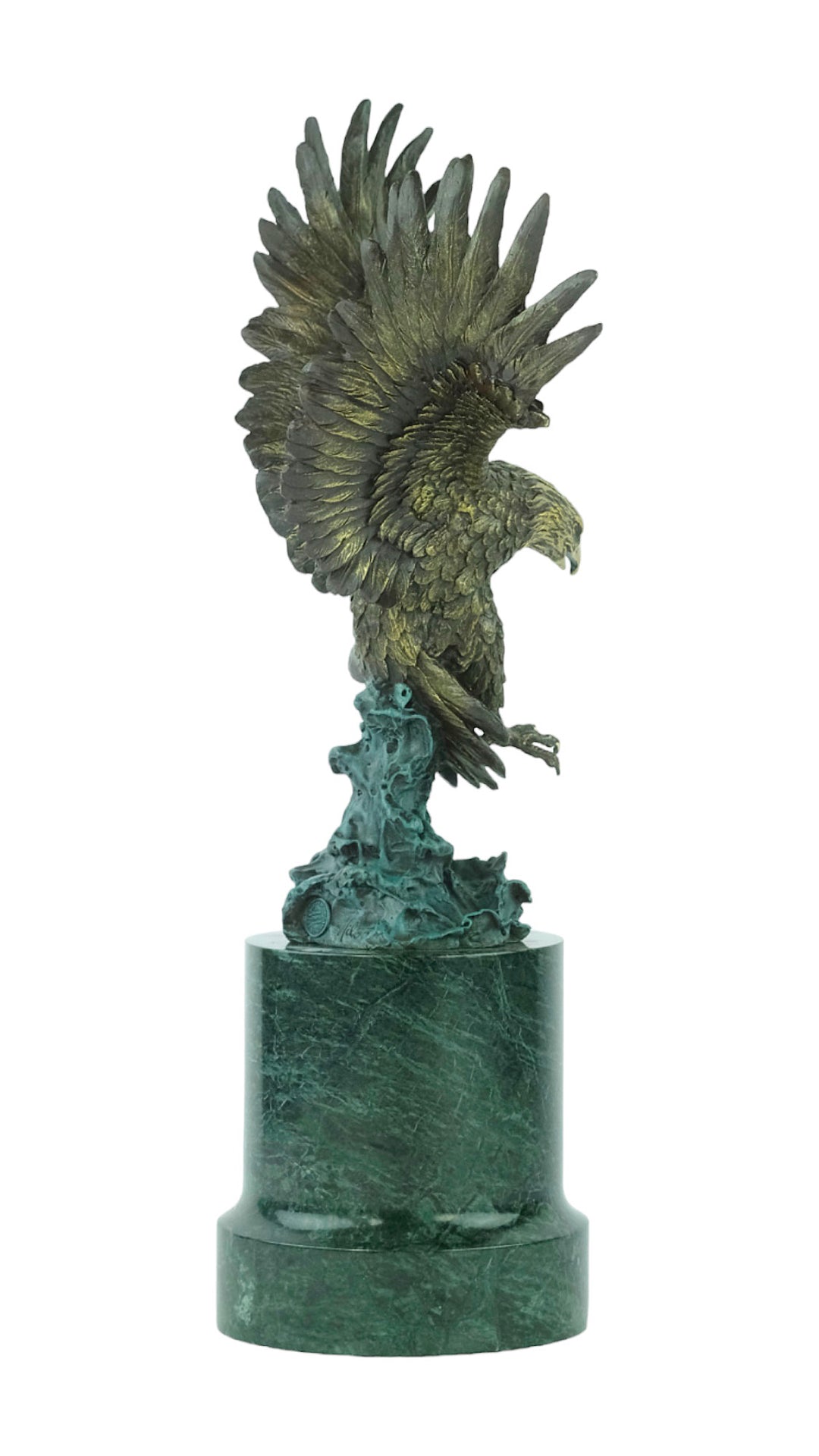 Large bronze sculpture of a fishing eagle with wings spread