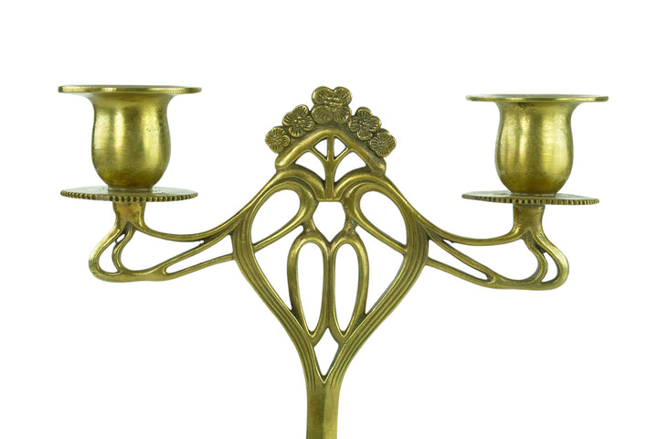 Set of two bronze candle holders in Jugendstil style