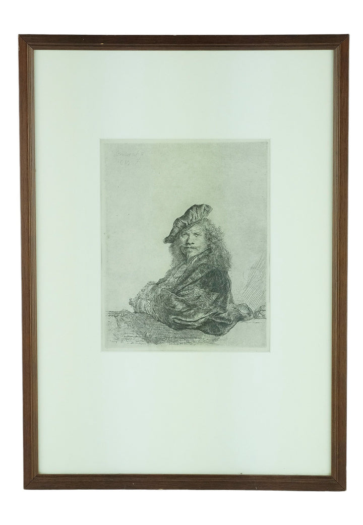 Framed selfportrait etching 'Leaning on a stone sill' by Rembrandt van Rijn