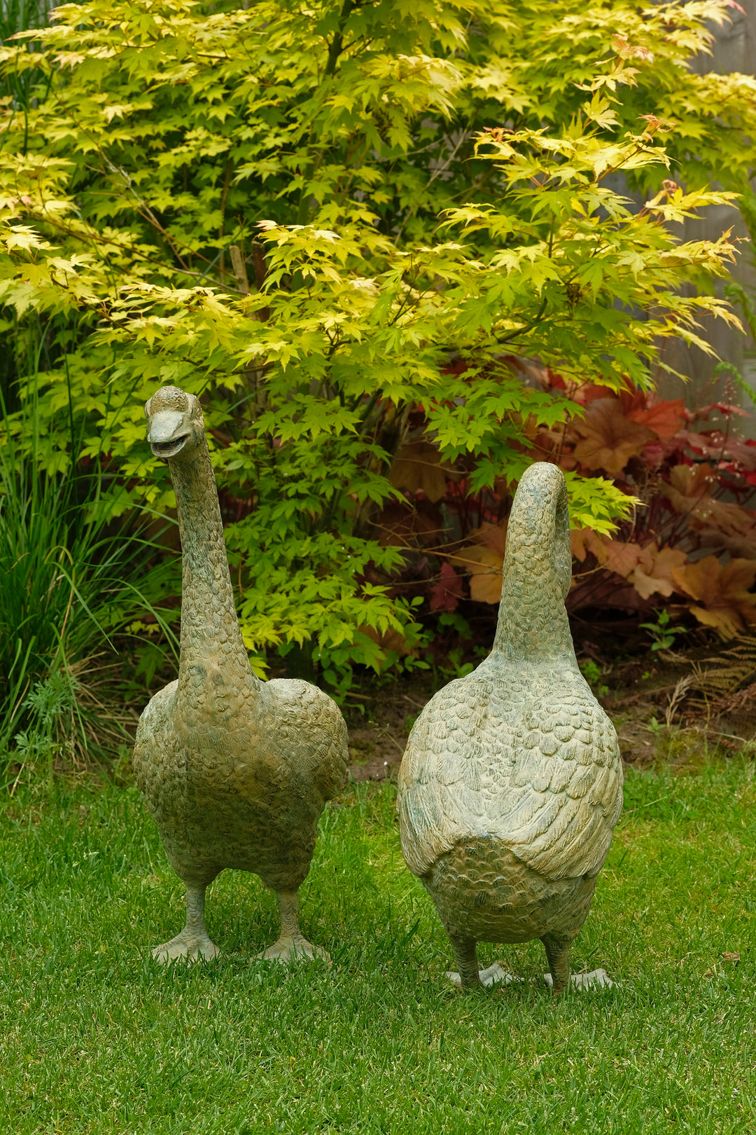 Lifesize bronze geese couple - green patina