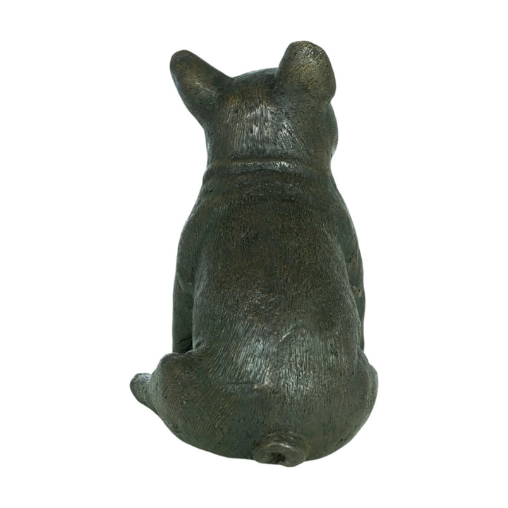 Back view of a bronze sculpture of a sitting French Bulldog, showcasing detailed craftsmanship and warm patina.