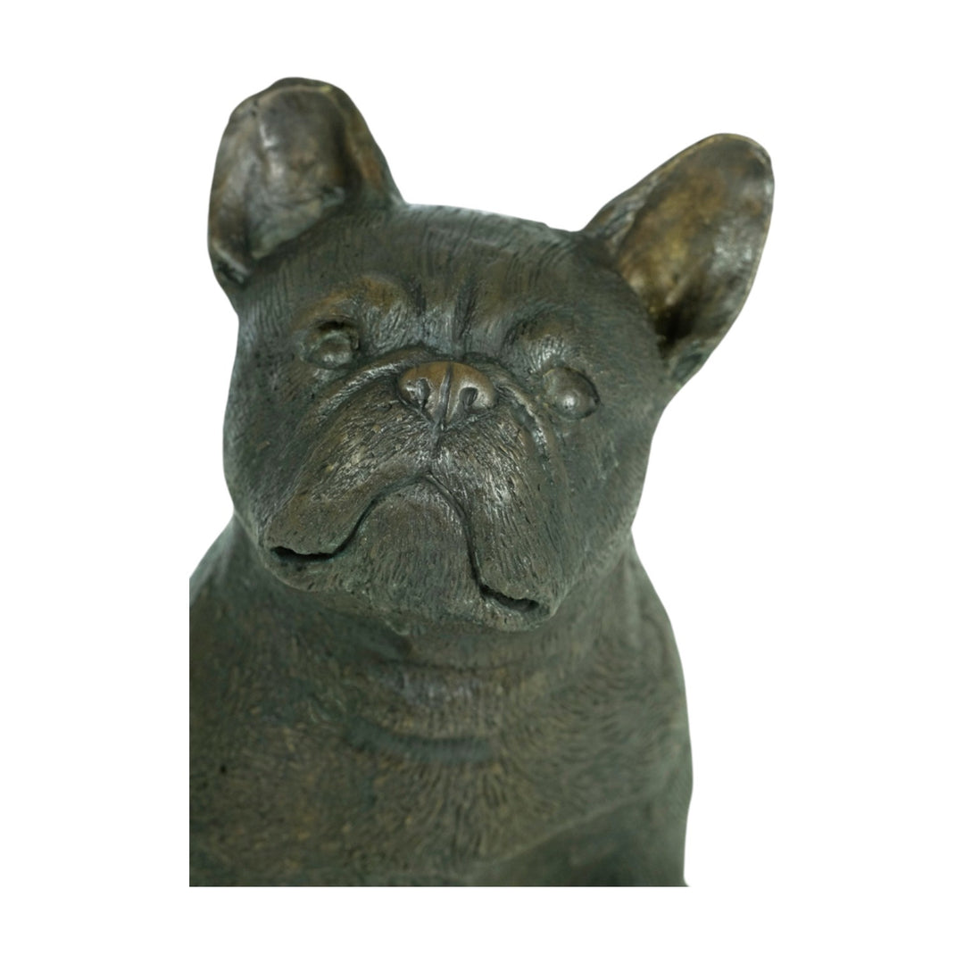 Bronze sculpture of a sitting French Bulldog, intricately detailed, warm brown patina, ideal for dog lovers.