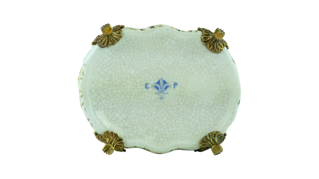 Porcelain box with floral decoration and a bronze snail