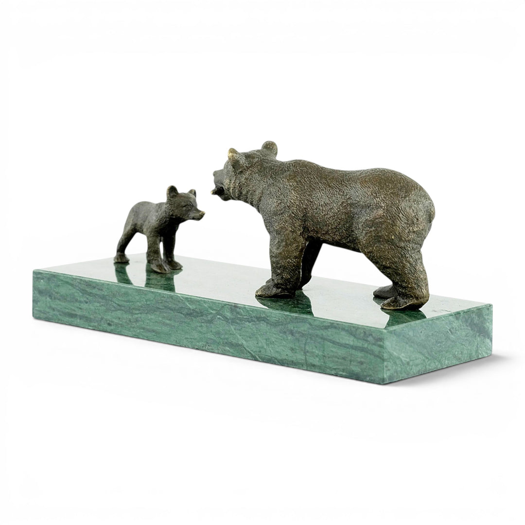 Bronze sculpture of a grizzly bear feeding her cub