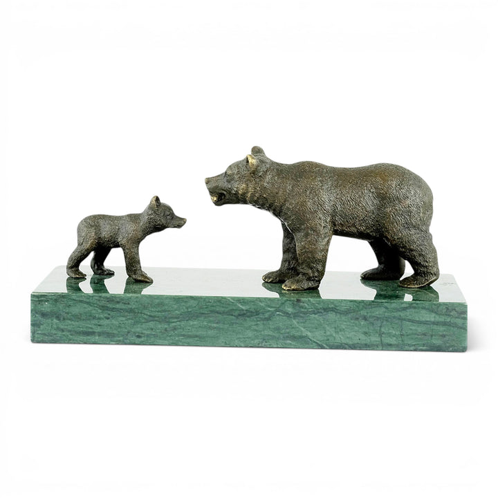 Bronze sculpture of a grizzly bear feeding her cub