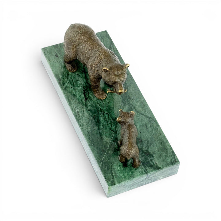 Bronze sculpture of a grizzly bear feeding her cub