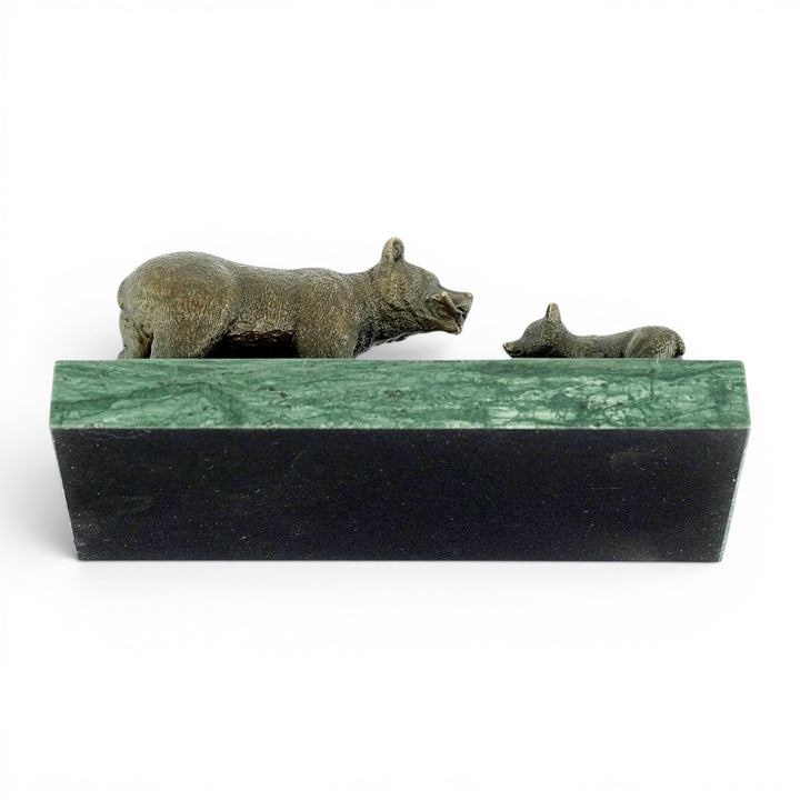 Bronze sculpture of a grizzly bear feeding her cub