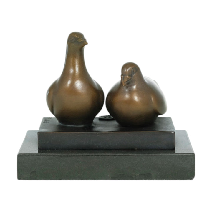 Bronze sculpture of a pigeon couple