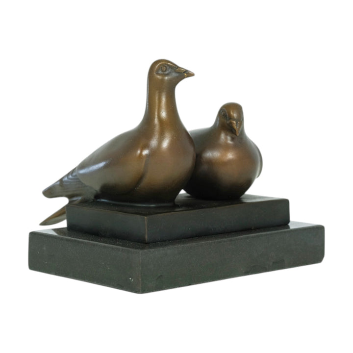 Bronze sculpture of a pigeon couple
