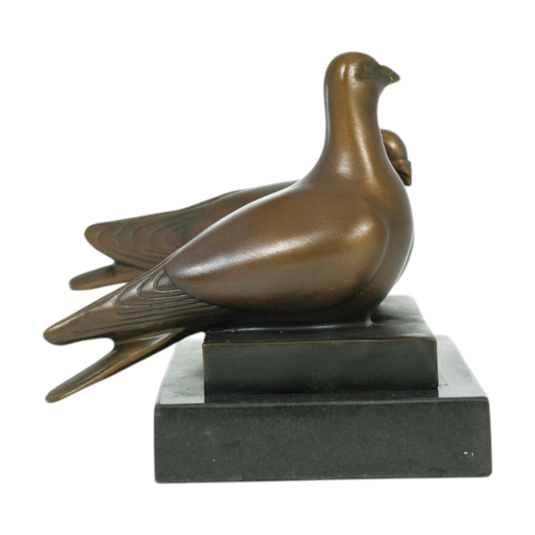 Bronze sculpture of a pigeon couple