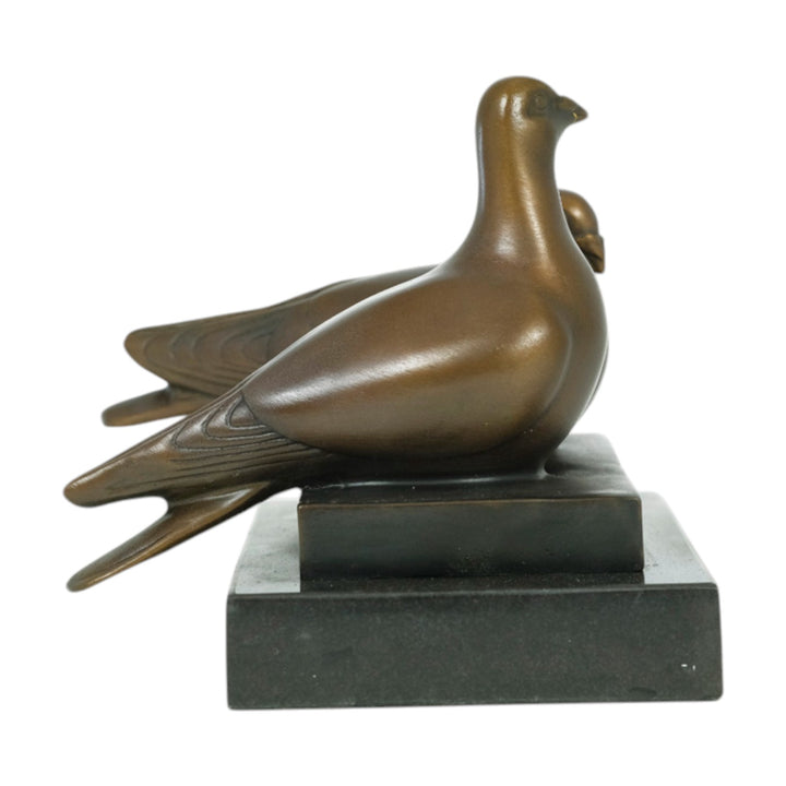 Bronze sculpture of a pigeon couple