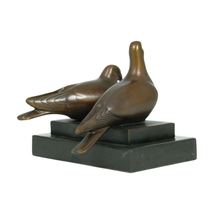 Bronze sculpture of a pigeon couple