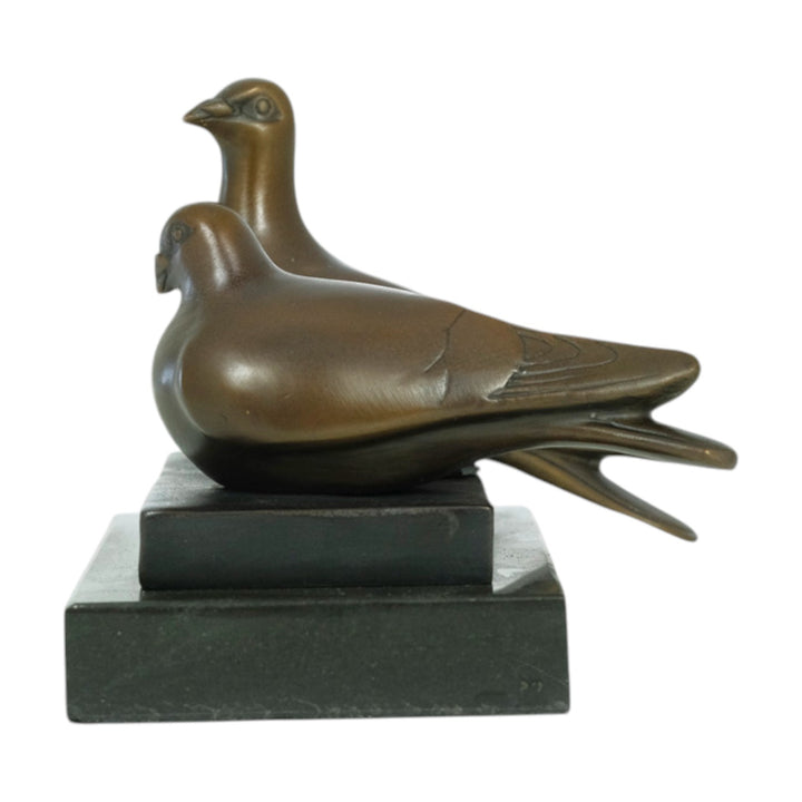 Bronze sculpture of a pigeon couple