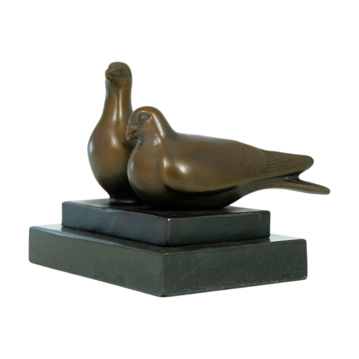Bronze sculpture of a pigeon couple