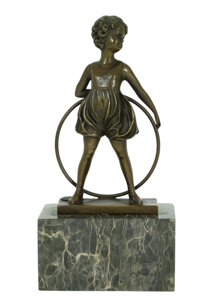 Bronze sculpture of a little girl with a hoop