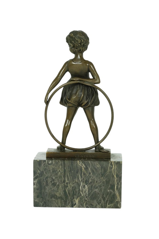 Bronze sculpture of a little girl with a hoop