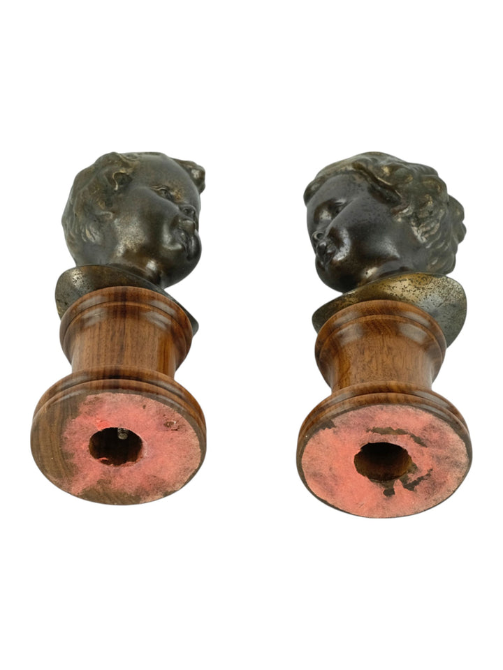 Ensemble de bustes anciens en bronze d'un garçon et d'une fille