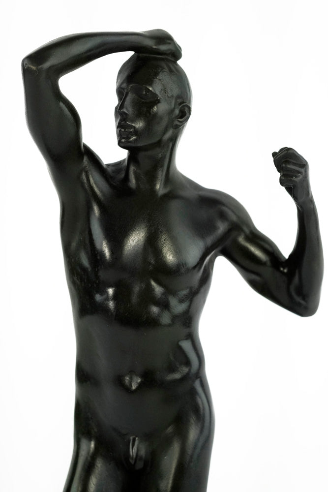 Bronze sculpture of a posing male after Rodin