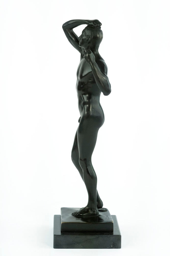 Bronze sculpture of a posing male after Rodin