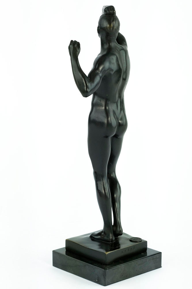 Bronze sculpture of a posing male after Rodin