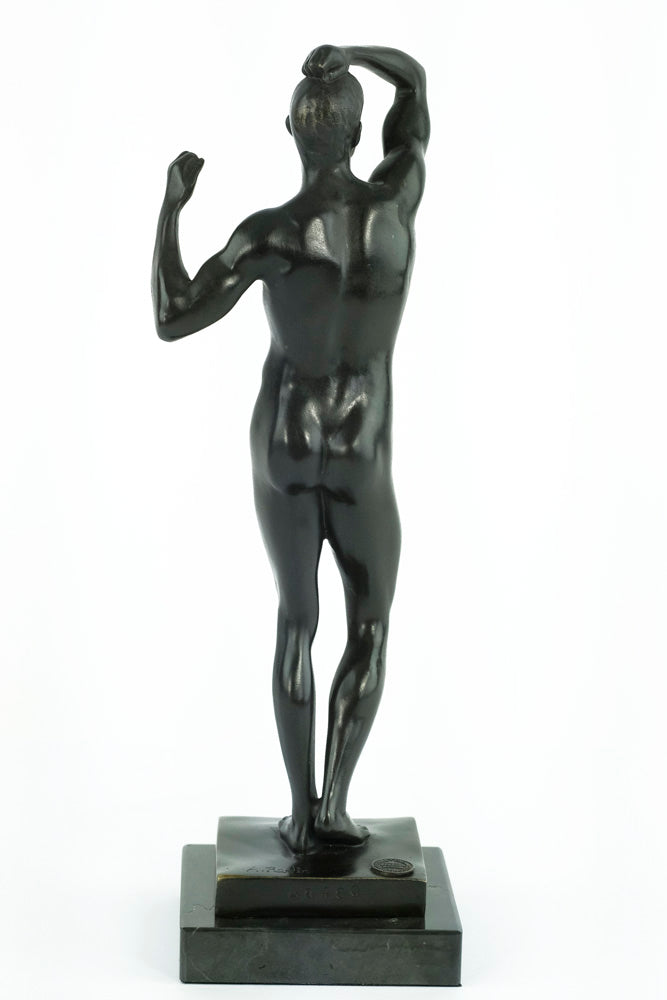 Bronze sculpture of a posing male after Rodin