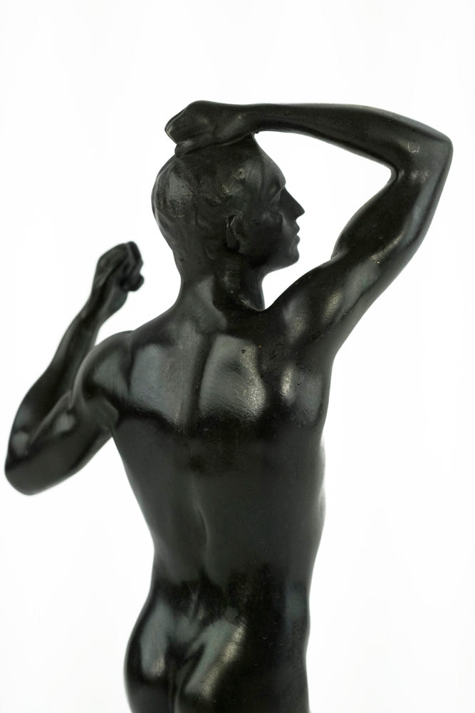 Bronze sculpture of a posing male after Rodin