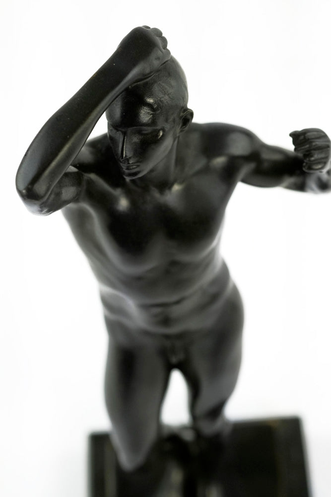 Bronze sculpture of a posing male after Rodin