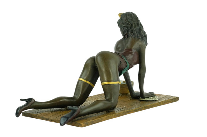Erotic bronze sculpture of a female scrubbing the floor