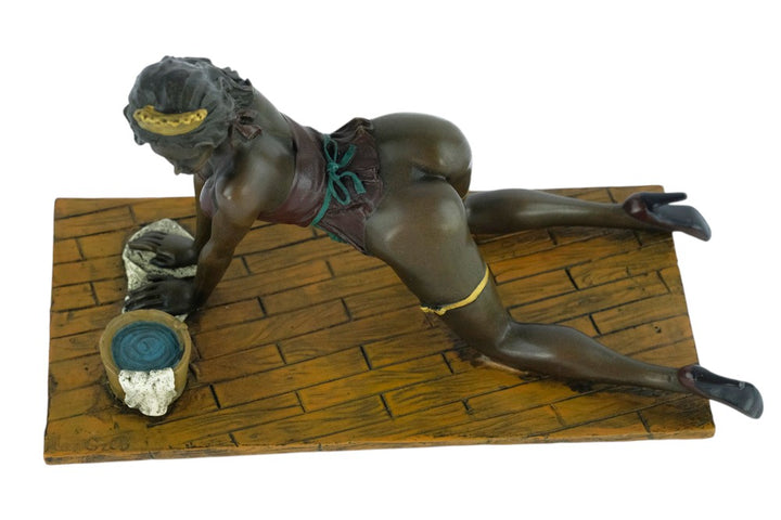 Erotic bronze sculpture of a female scrubbing the floor