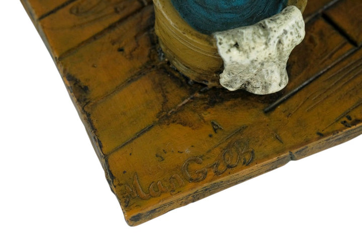 Erotic bronze sculpture of a female scrubbing the floor