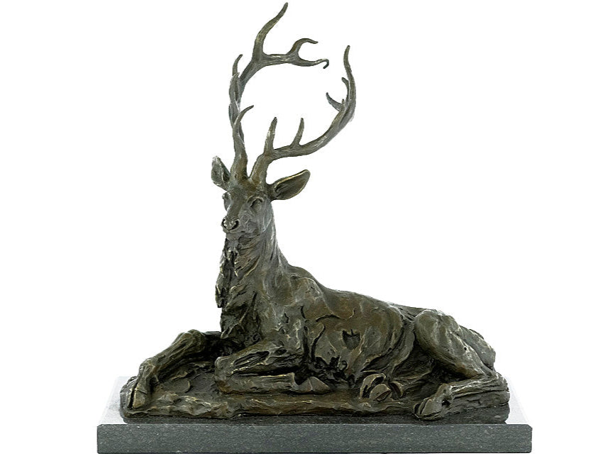 Large bronze sculpture of a reclining deer