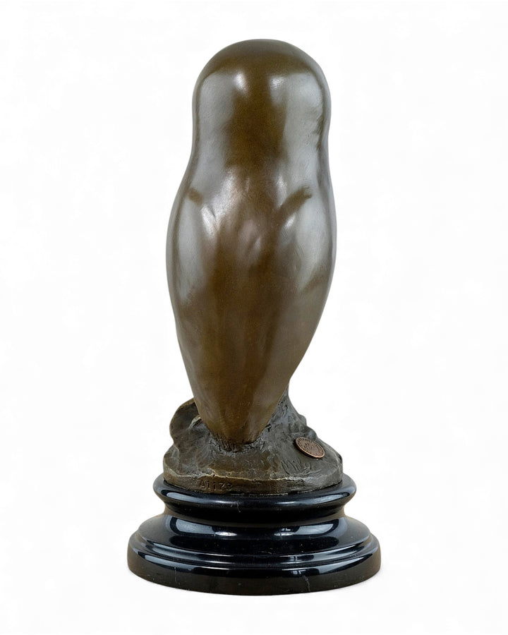 Bronzen beeld van een jonge uil