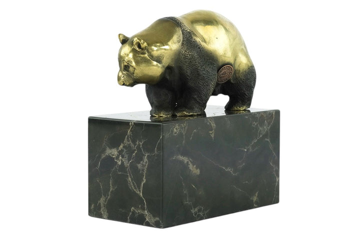 Bronze sculpture of a walking panda bear