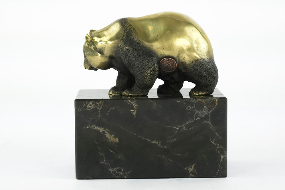 Bronze sculpture of a walking panda bear