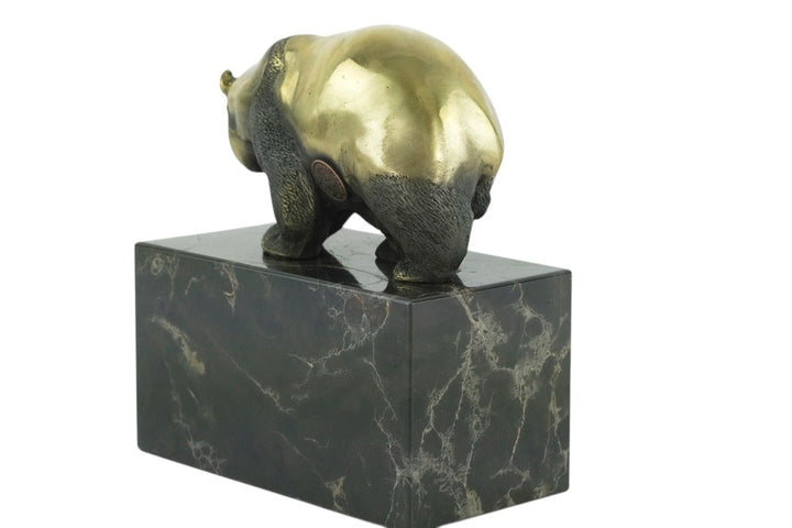 Bronze sculpture of a walking panda bear