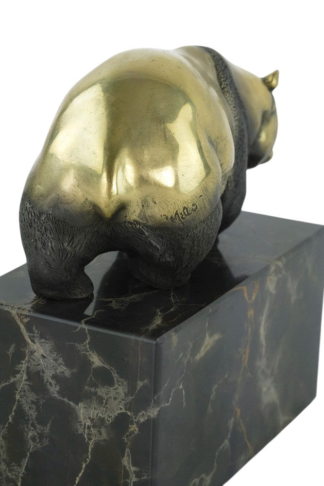 Bronze sculpture of a walking panda bear
