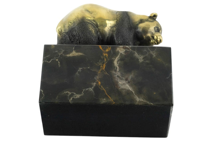 Bronze sculpture of a walking panda bear