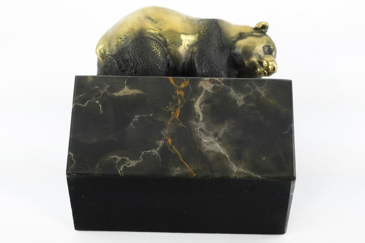 Bronze sculpture of a walking panda bear