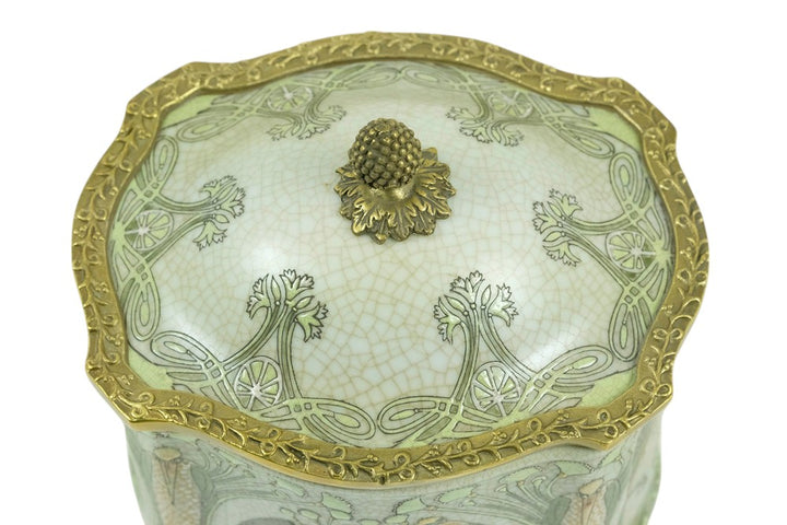 Bronze mounted porcelain box with floral decoration and storks