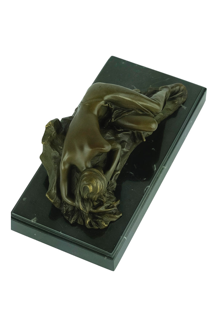 Bronze sculpture of a female sleeping on a rock - inspired by Rodin