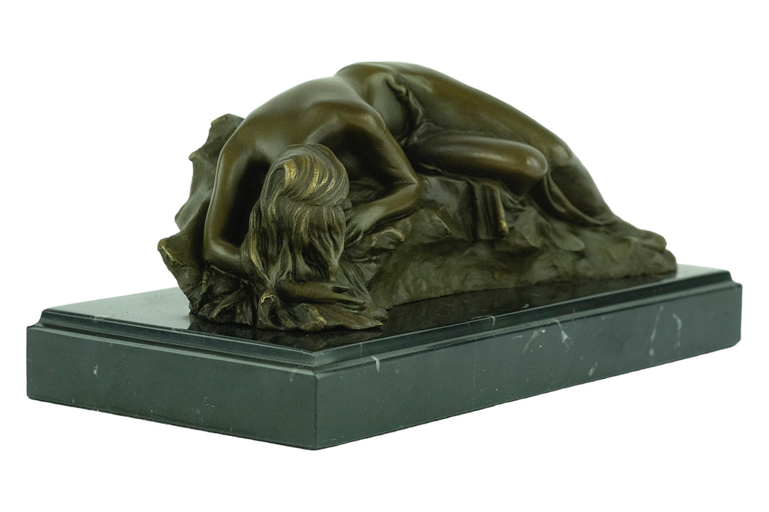 Bronze sculpture of a female sleeping on a rock - inspired by Rodin